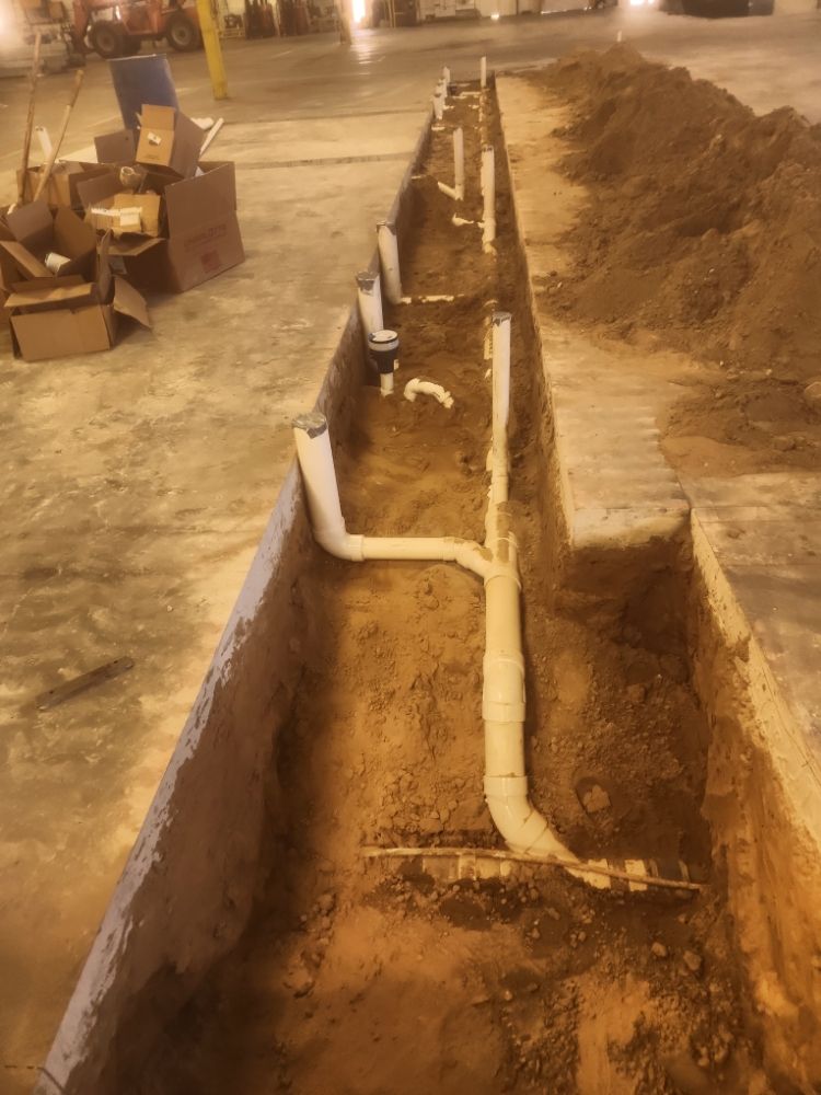 Professional plumber working on residential plumbing in Allegan County, Michigan